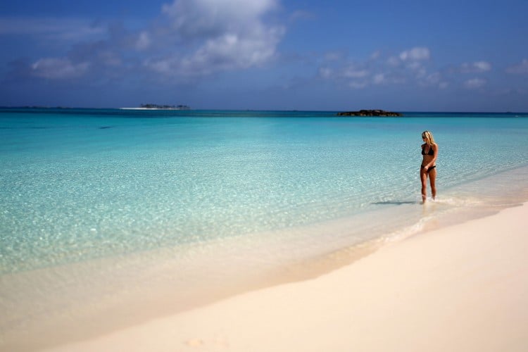 Woman walking on the beach