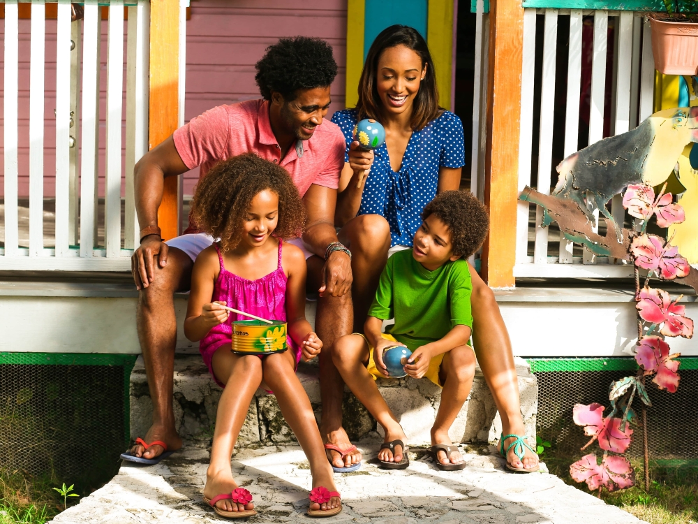 A family at the Craft Cottage in Nassau Paradise Island