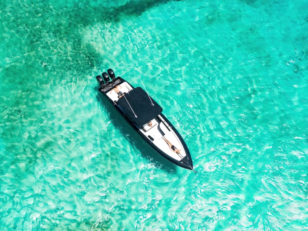 A woman floating on a boat in Nassau