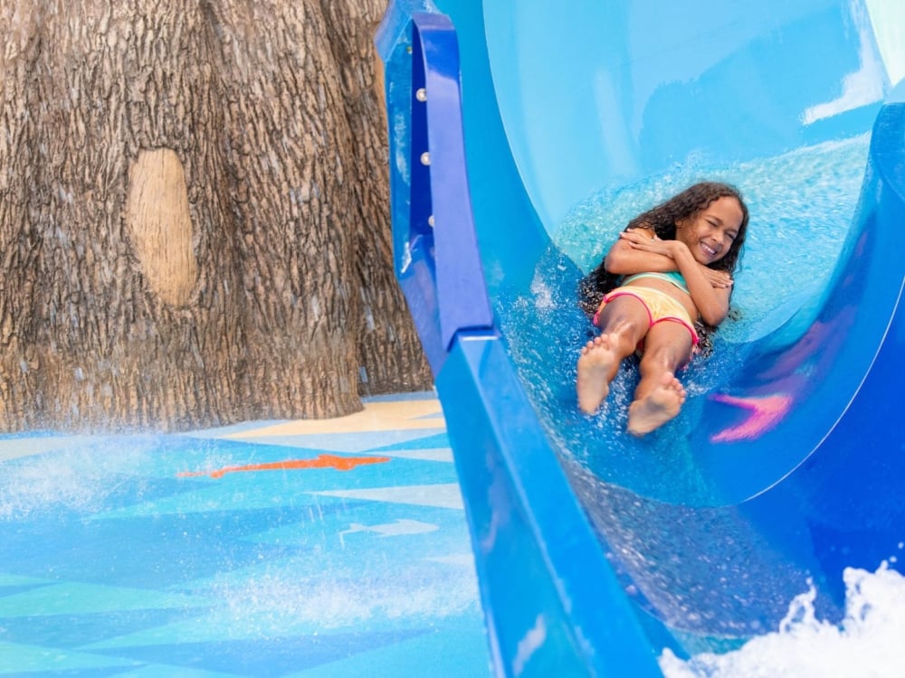 A girl on a waterslide at Margaritaville