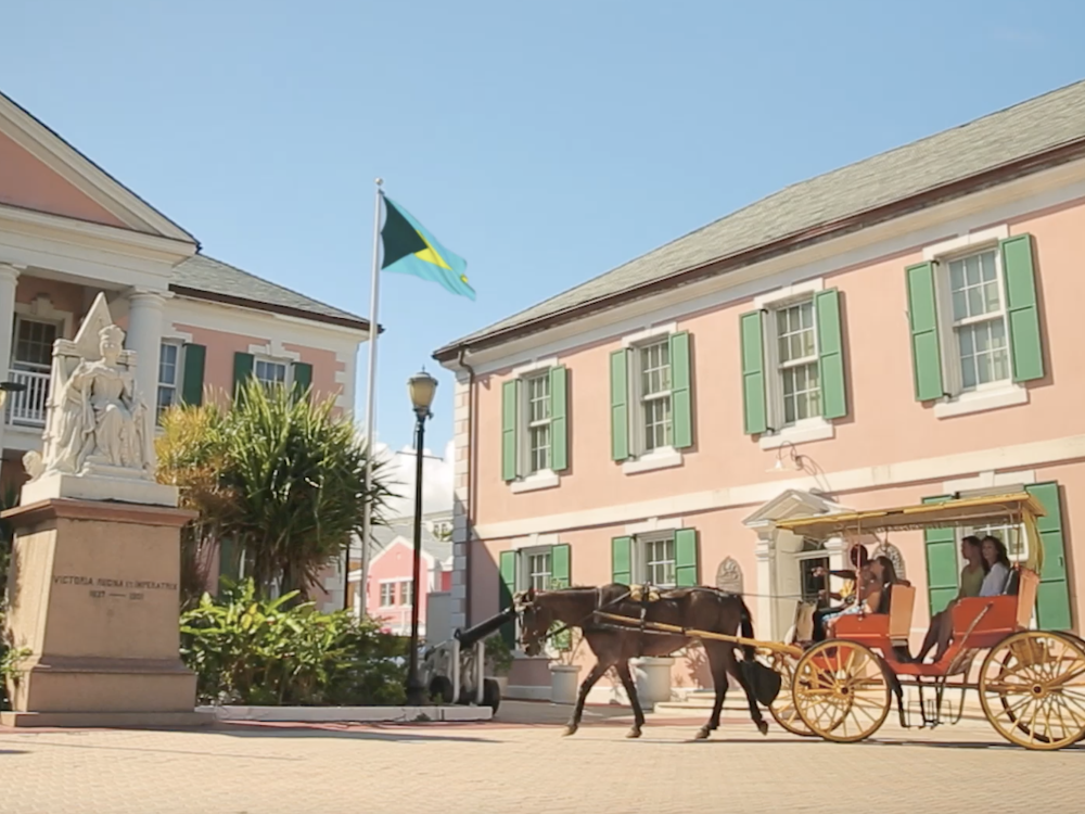 A family in a horse and carriage in Nassau