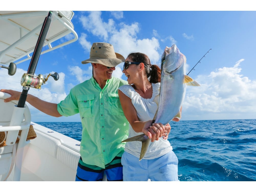 couple fishing on boat