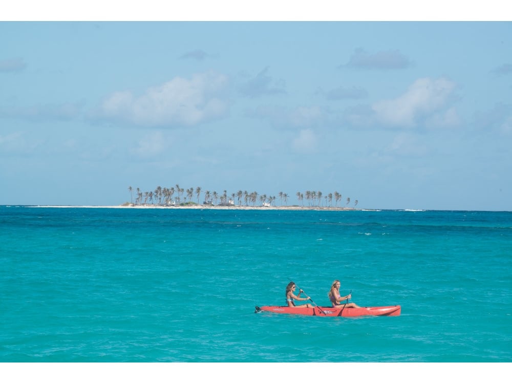 two women on a kayak in the ocean