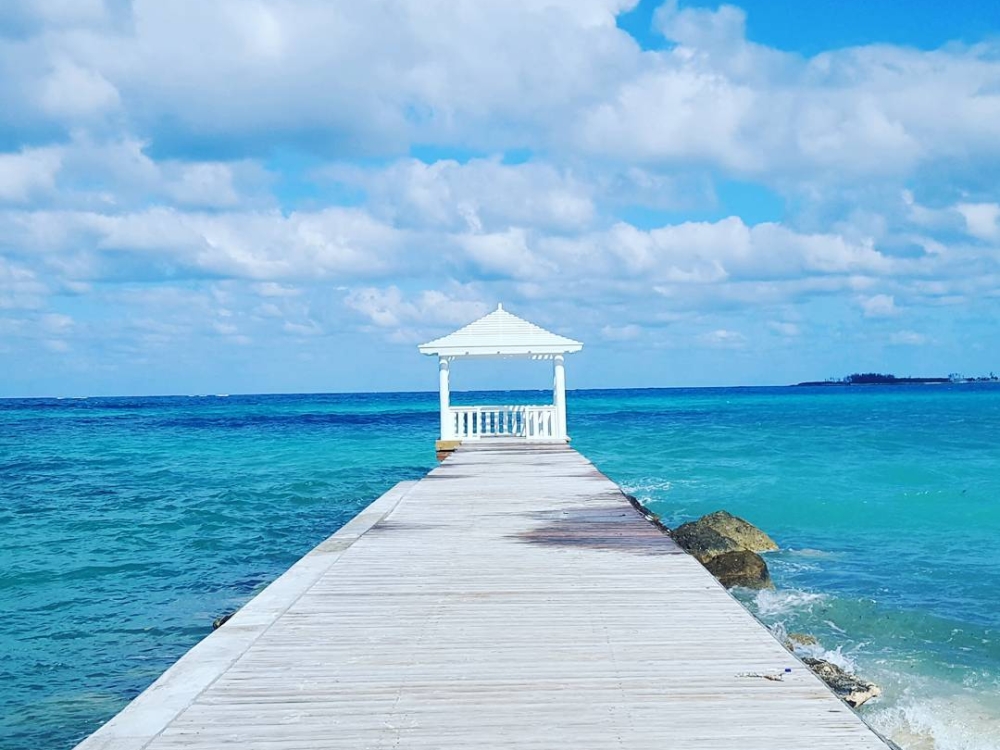Pier overlooking the turquoise waters of Nassau Paradise Island Bahamas