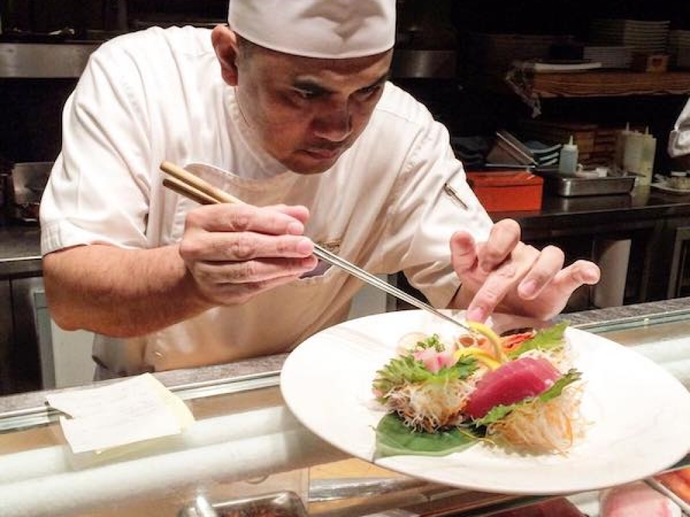 A sushi chef prepares a gorgeous dish at Nobu Restaurant in Atlantis Resort, Paradise Island Bahamas