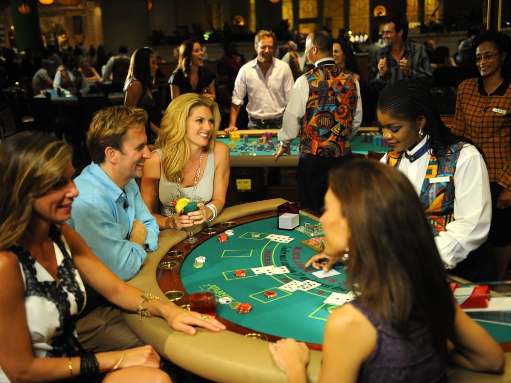 Guests play table games at the Casino at Atlantis in The Bahamas.