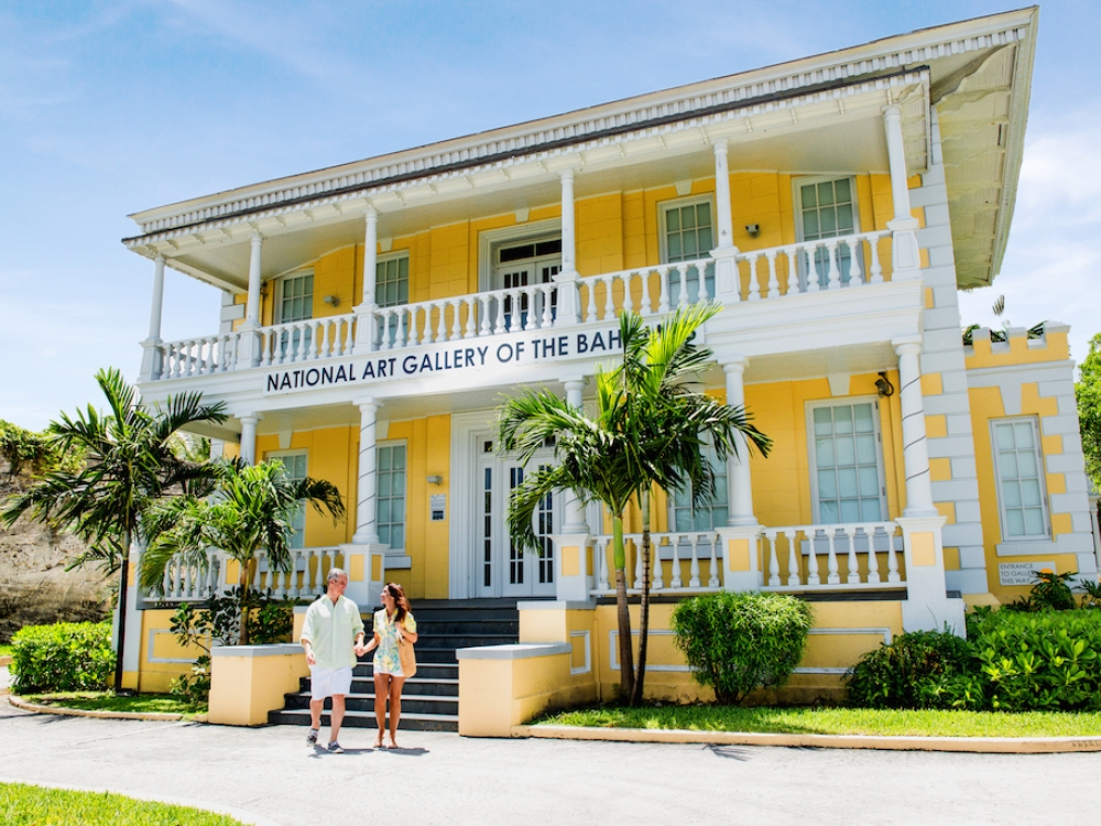 A couple leaves the National Art Gallery of The Bahamas.