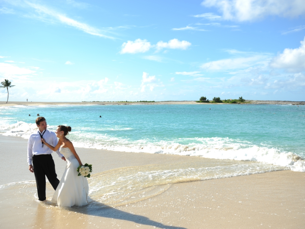 A couple on the beach, just married