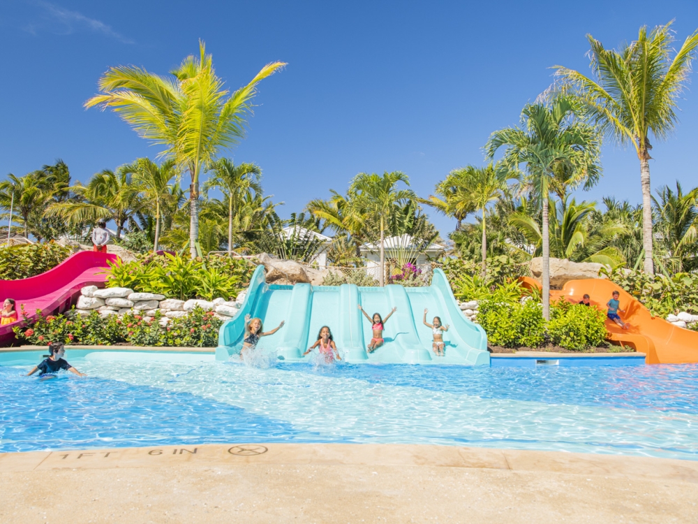 kids going down a waterslide