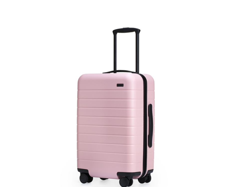 Millennial pink carry-on suitcase by Away