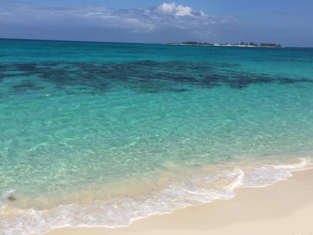 Waves of warm Bahamas water wash ashore on Cable Beach.