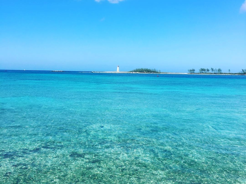 Clear turquoise water and a bright blue sky in The Bahamas.