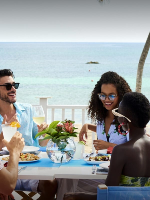 A group dining in Nassau Paradise Island