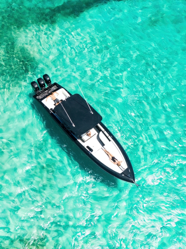 A couple on a boat in The Bahamas