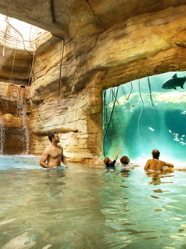 A family in the pool at Atlantis Paradise Island