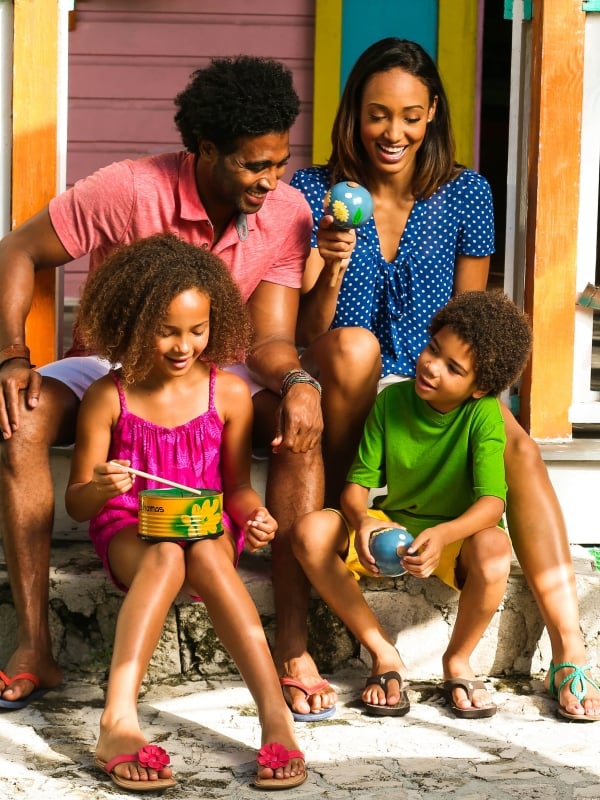 A family at the Craft Cottage in Nassau Paradise Island