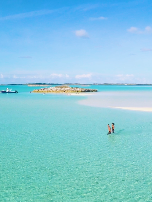 A couple walking on the beach in Nassau Paradise Island