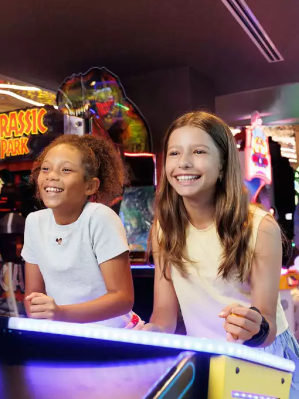 kids playing in arcade