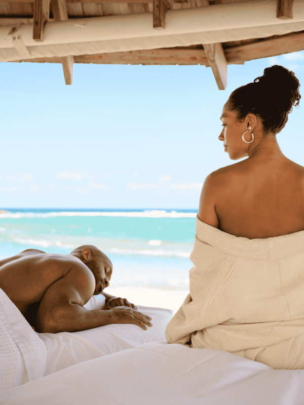 couple getting a beach side massage 