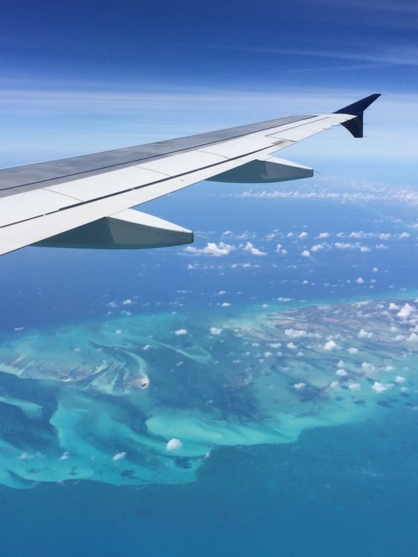 A view of Bahamas' turquoise waters from an airplane. 