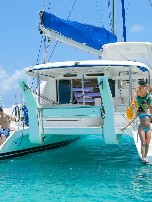 A group of snorkelers on a catamaran in The Bahamas