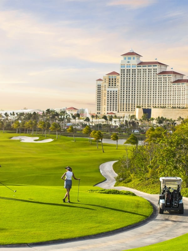 A couple tees of at the Royal Blue Golf Course in Nassau, Bahamas. 