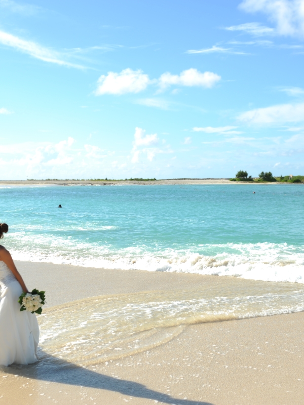 A couple on the beach, just married