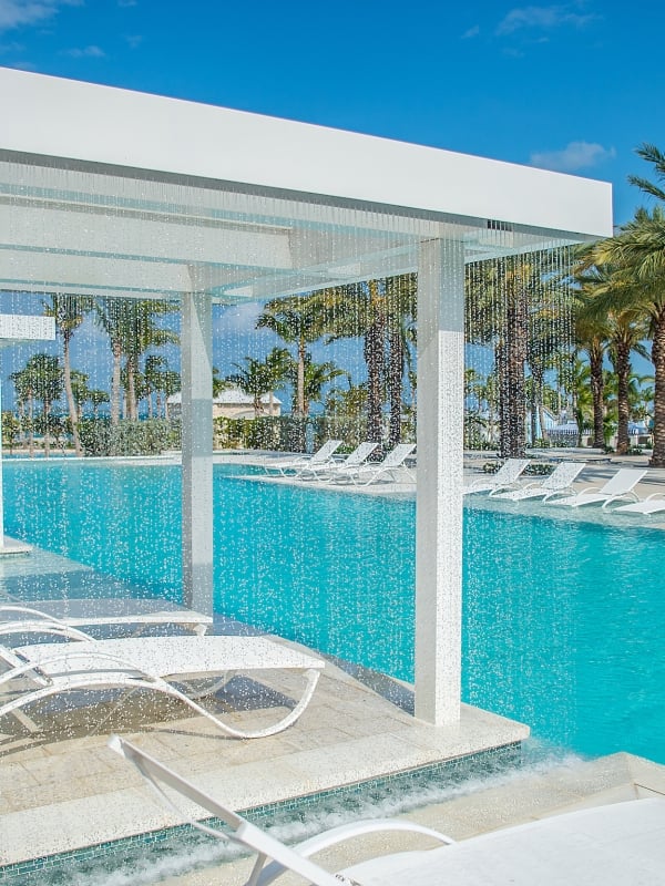 Refreshing white loungers and poolside cabanas at Baha Mar.