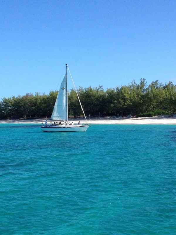 Sailboat in blue water